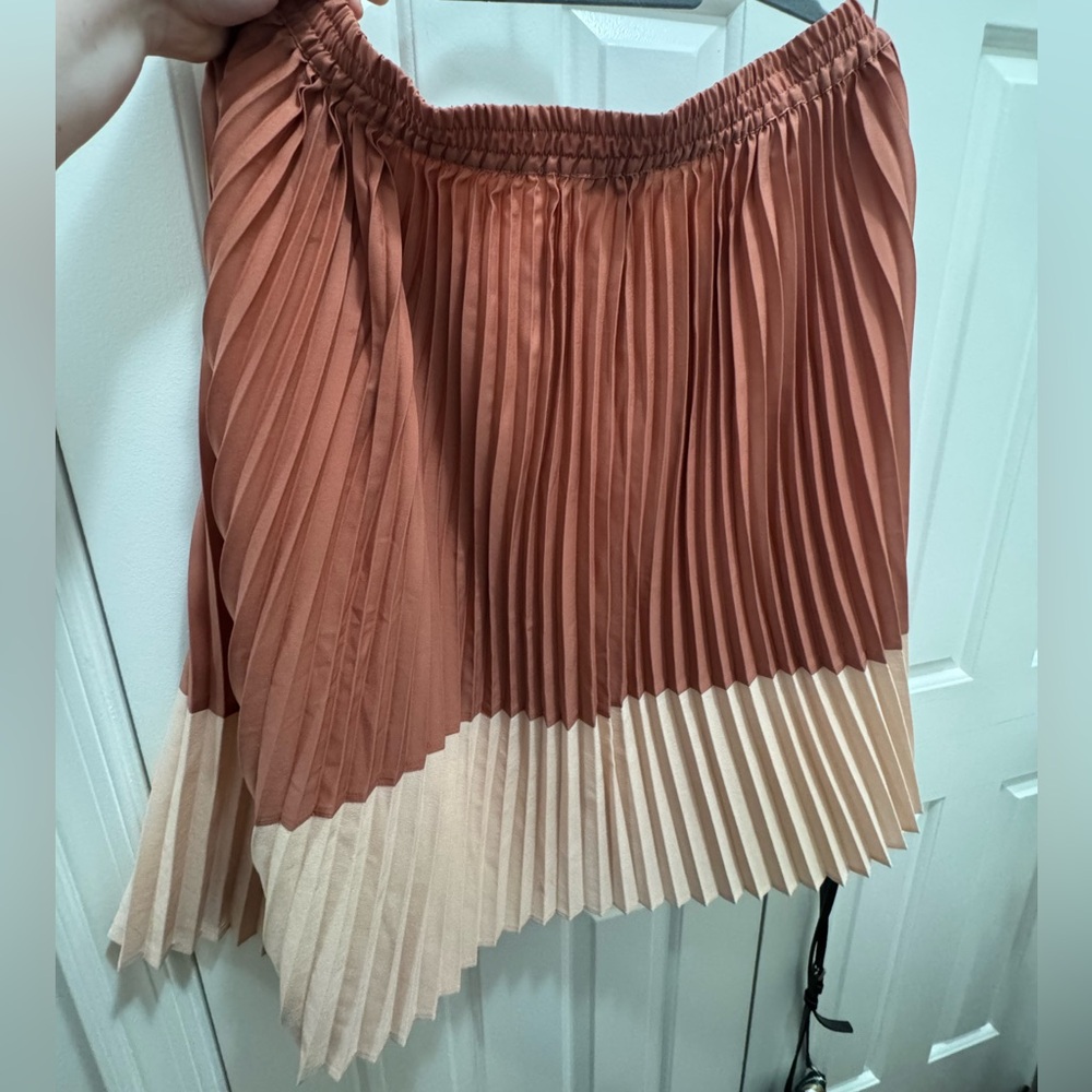 Asymmetrical terracotta pleated skirt, like new